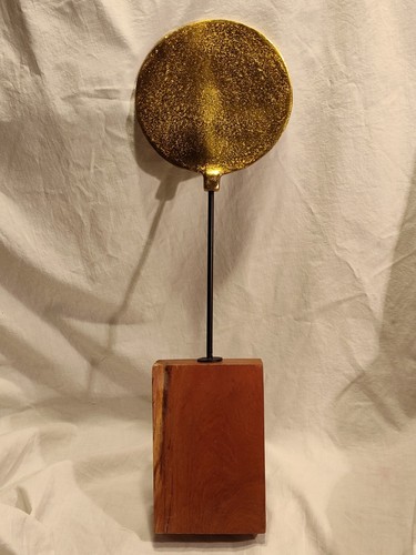 Scultura sole minimalista