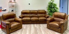 divano in vera pelle + due