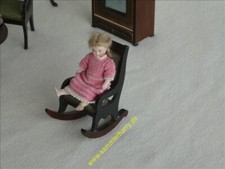 piccola sedia a dondolo