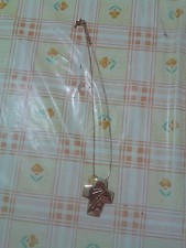 Collana color oro con crocifisso stilizzato