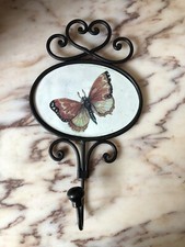appendiabiti in ferro battuto A Parete Un Posto Con Farfalla