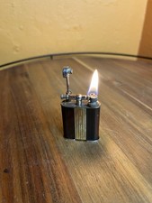 Accendino vintage The Golden Wheel tono tartaruga braccio di sollevamento