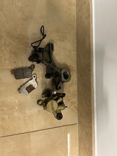 Pinza freno posteriore +