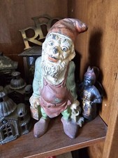 ANTICO GNOMO IN GHISA CON