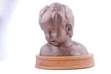 Mezzo busto di bambino Luigi Ferrario Gesso color bronzo Altezza 34 cm.