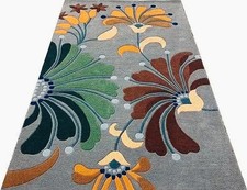 Tappeto trapuntato a mano