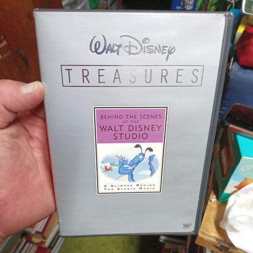 Walt disney treasures behind - walt,