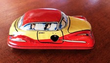 Automobiline giocattolo  Shuko in latta a molla.