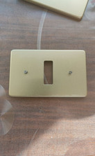 Placca alluminio color oro 1 posto/foro Vimar 7000. Rara