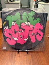 Travis Scott x KAWS The Scotts