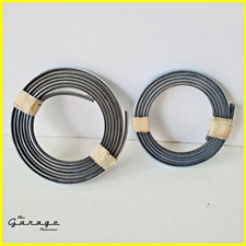Pair of chrome glass gaskets