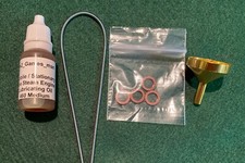 Confezione accessori vapore Mamod, 1 imbuto, 4 rondelle, 1 x cintura di trasmissione, 1 x 460 olio