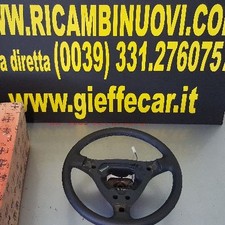 Volante pelle nera con - in,