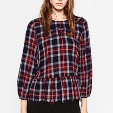 Top Peplum ricamato a quadri