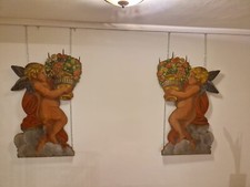 Antichi candelabri da parete