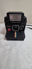 Macchina fotografica istantanea Polaroid Time Zero One Step nera arcobaleno con cinturino non testata