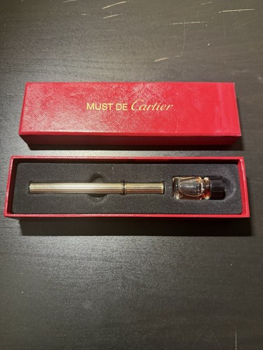Must cartier refillable - cartier,