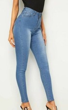 jeans skinny slavati con vita alta donna