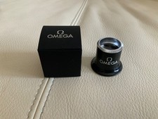 OMEGA magnifying glass