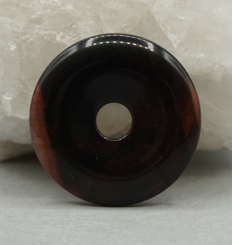 Occhio tigre rosso - di,