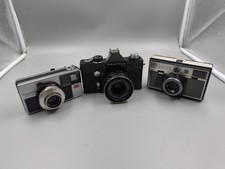 3 macchine fotografiche. Braun
