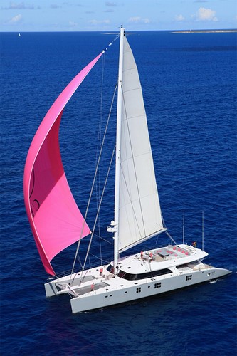 Boaters sailing catamaran - on,