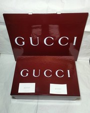 Scatola Gucci con carta crespa sacchetto cartellino e lacci di ricambio bianchi