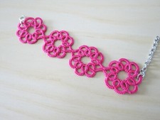 Braccialetto chiacchierino - modello fiori fucsia