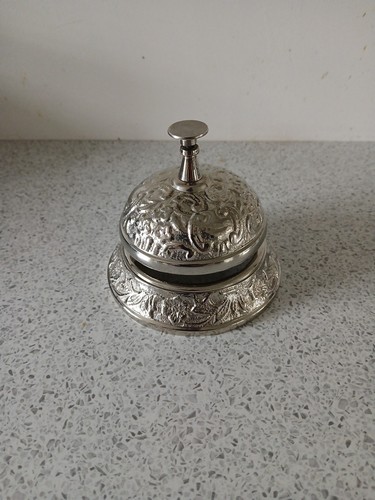 Ornate silver coloured bell - ornate,
