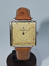 Tommy Bahama 36 mm tono oro