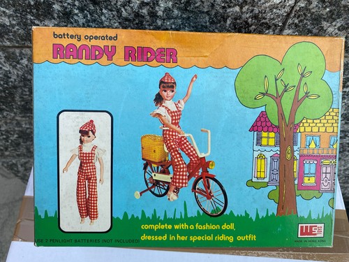 Rarissima bambola con bici