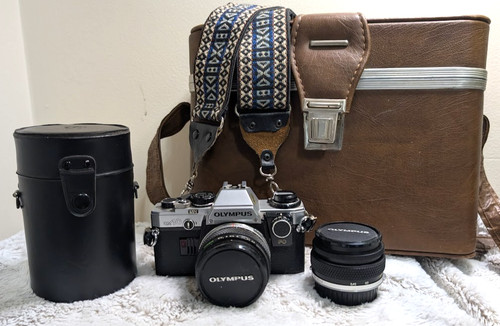 Olympus tre obiettivi - +,