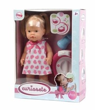 Falca Bambola Curiosete Con Vasino Sonoro ( Può variare il colore del vestitino)