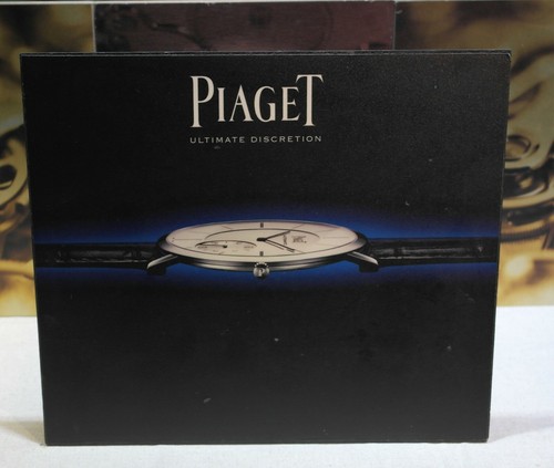 Piaget plastic photo display - piaget,