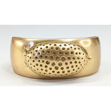 Bracciale Tom Binns LH grosso tono oro con fragranza/medaglione in gabbia