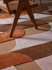 Tappeto trapuntato a mano