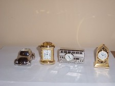 OROLOGIO DA TAVOLO PER VETRINA  NUOVI DA COLLEZIONE 4 PEZZI  