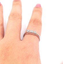 TRILOGY CON 3 ZIRCONI IN ARGENTO 925 RODIATO IN ORO BIANCO 18 KT