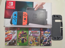 Nintendo Switch modello JPN completa con scatolo, custodia morbida e 4 giochi