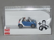 Busch 50779 Smart Fortwo Cabrio con conducente e seggiolino 1:87 NUOVO + IMBALLO ORIGINALE