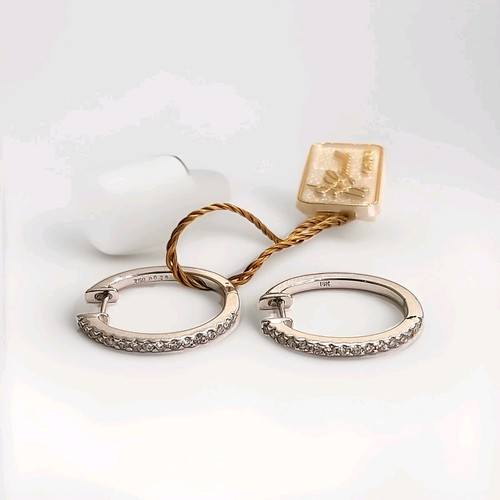 Orecchini cerchi con diamanti