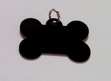 Piastrina Colorata  Forma osso colore nero con incisione