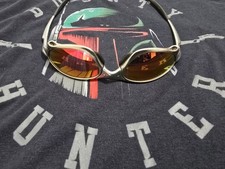 OAKLEY X-METAL PENNY TELAIO IN TITANIO CON RUBINO IRIDIO SERIALIZZATO 