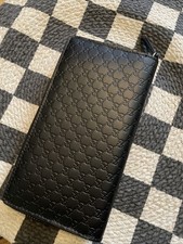 NEW Gucci Embossed Leather Zip