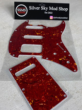 STERLING BY MUSIC MAN CUTLASS BATTIPENNA DI RICAMBIO E PIASTRA POSTERIORE TARTARUGA ROSSA