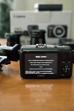 Canon EOS M - Kit Cinema Completo, 3 lenti, camera-rig, filtri e batterie