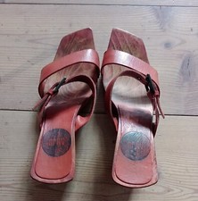 Zoccoli in legno. Colore ruggine. Marca Miju. 