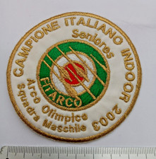 Toppa-Campione Italiano indoor 2003 Arco olimpico tessuto oro mm. 80