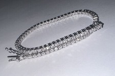 BRACCIALE TENNIS ORO BIANCO 18kt. e DIAMANTI NATURALI TAGLIO BRILLANTE ct. 2,52