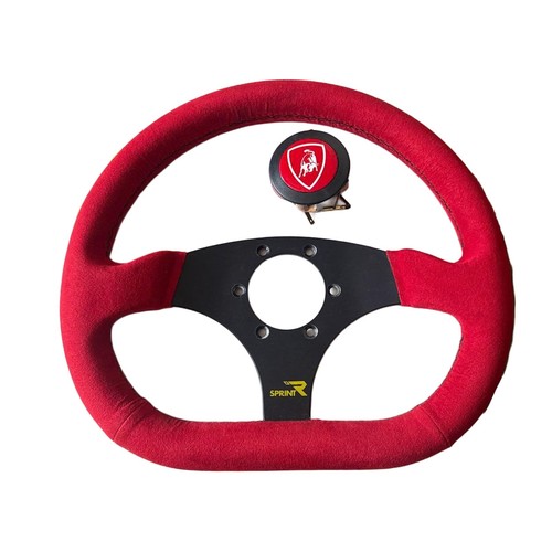 Volante camoscio rosso - in,